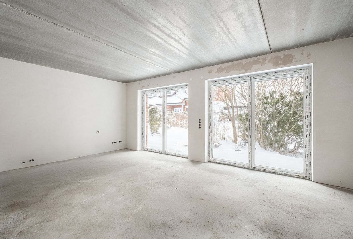 Neubau-Reihenendhaus rechts Wohnzimmer vorher